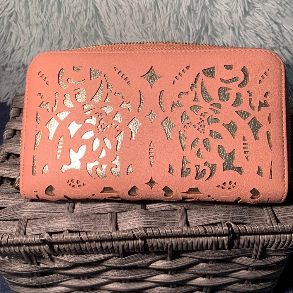 Pink and gold flower patterned clutch
